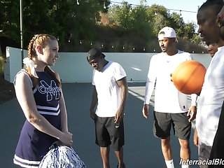 Black basketball crew is face fucking white cheerleader Arietta Adams